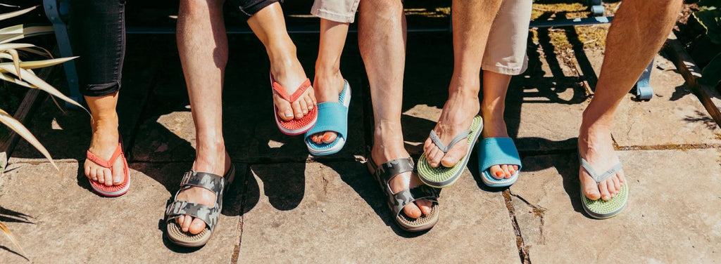 Landscape image of customers wearing new revs reflexology sandals